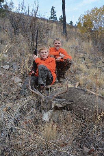 A young hunter often decides if he or she will continue to hunt depending on previous success. Here Jason’s youngest son Ryan has filled his buck tag – a new hunter is born.